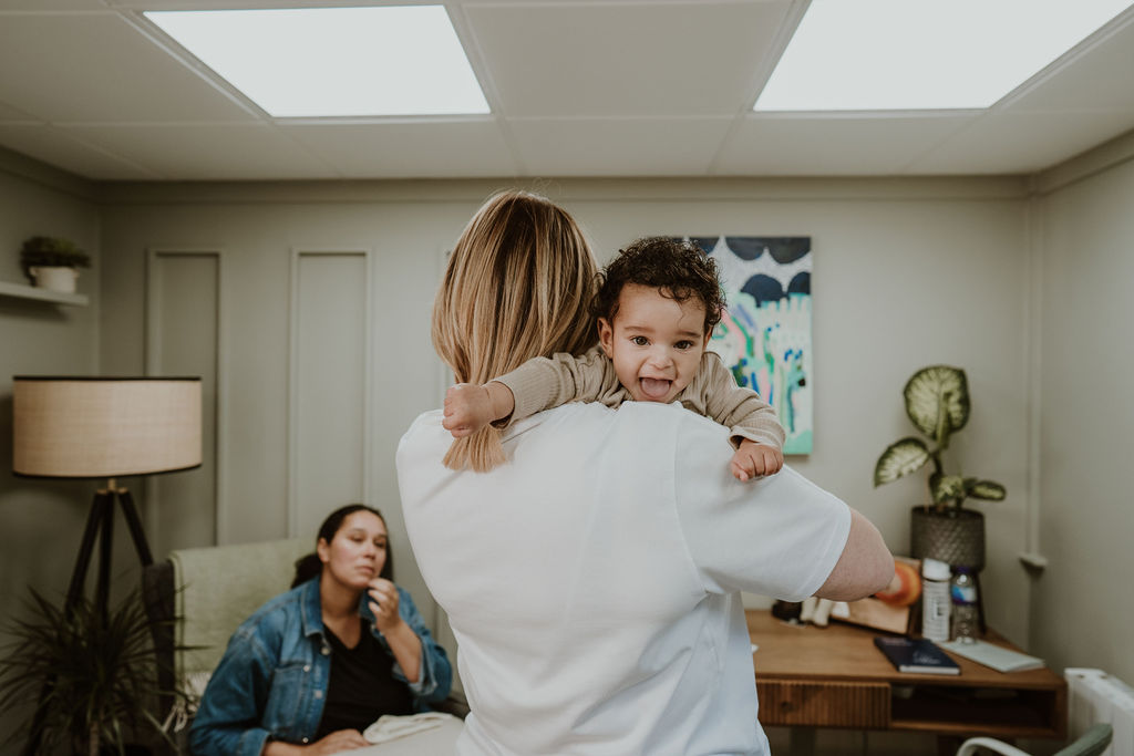 happy baby over shoulder