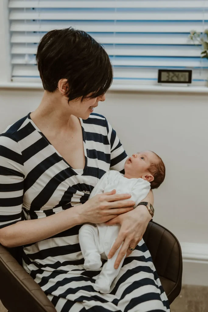 baby being held in arms